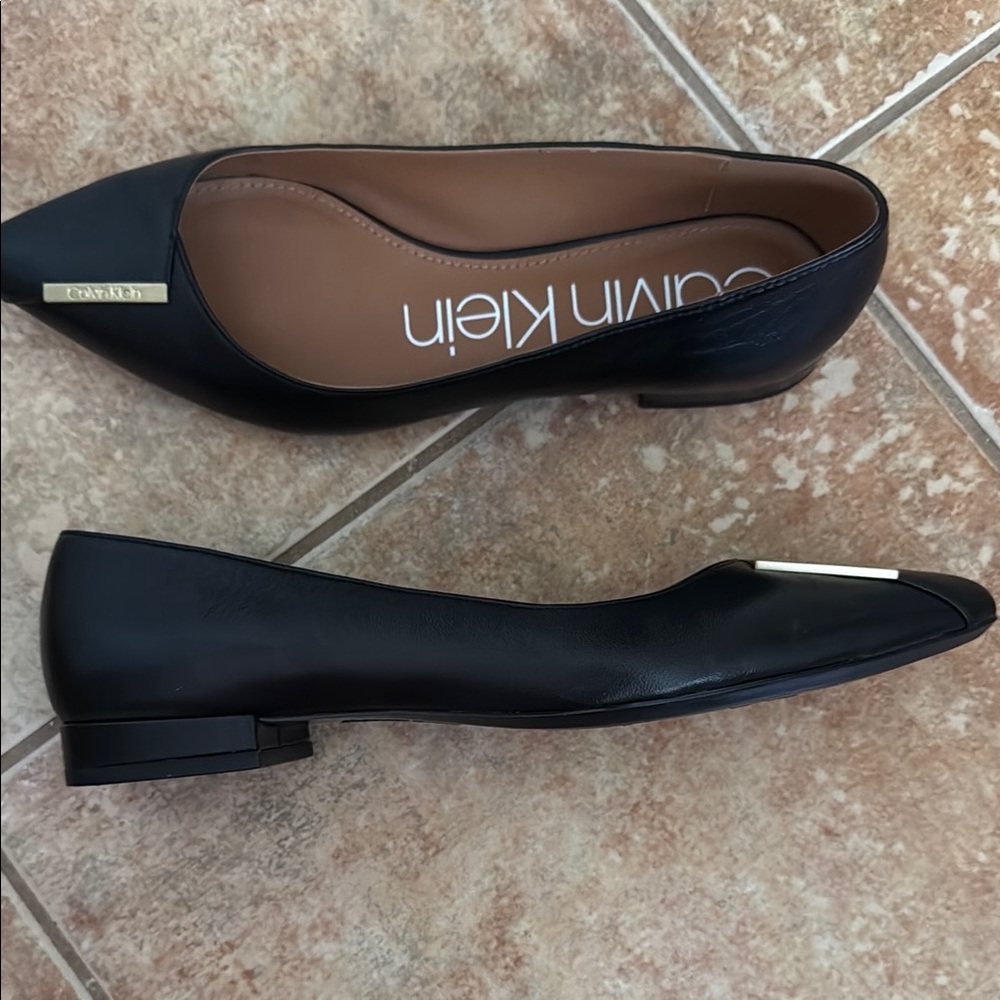 Calvin Klein Black Flats Elegant Design
